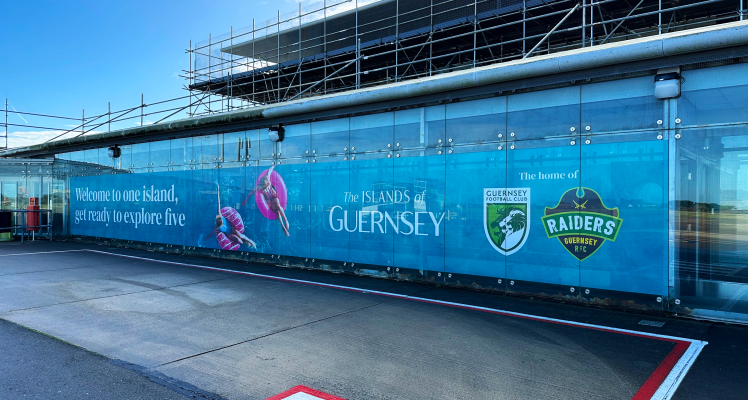 VisitGuernsey and Guernsey Ports celebrate new airport panels showcasing Island’s unique appeal