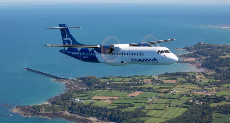 Blue Islands aircraft flying in sky