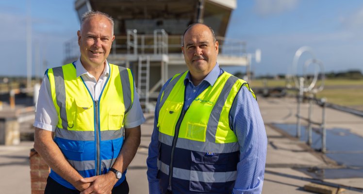 Current MD Colin Le Ray with incoming MD Ross Coppolo at Guernsey Airport