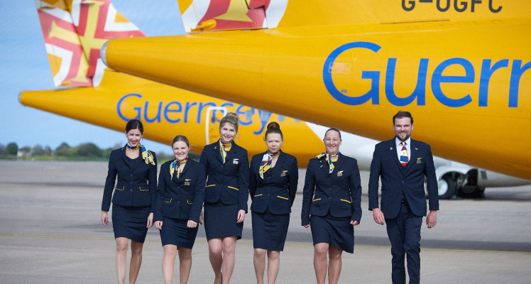 Aurigny cabin crew near aircraft