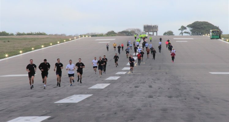 Runners on Guernsey Airport runway